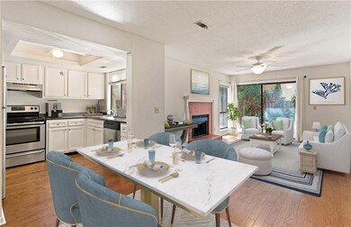 View from dining area to kitchen and living room