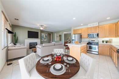 Kitchen is equipped with stainless steel appliances and an abundance of counter space.