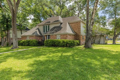 Huge corner lot with mature oak trees creating coo