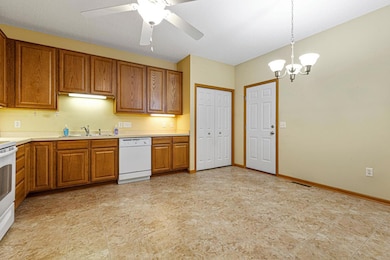 large kitchen with pantry and garage access