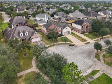 Home is located in a cul-de-sac, notice sidewalks