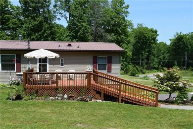 EXTERIOR BACK/DECK WITH ENTRANCE TO KITCHEN/LAUNDR