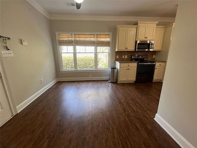 Breakfast room with access door to garage.