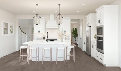 Kitchen with island and pendant lighting
