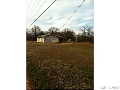 Exterior Front - Structure deemed worthless.