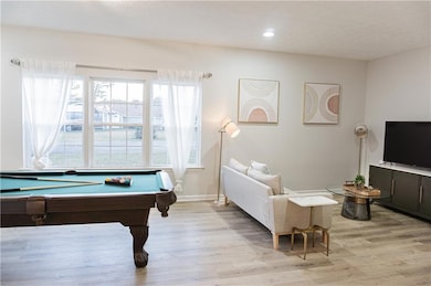 Playroom featuring billiards, recessed lighting, b