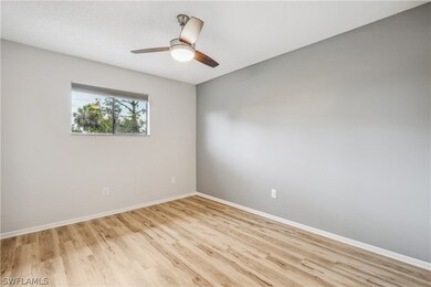 Empty room with light hardwood / wood-style floors
