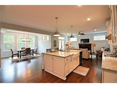 Look at how much light gets to the kitchen from all of those windows.