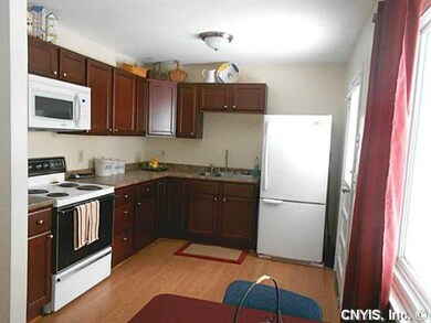 Kitchen. New cabinetry, counters, flooring, and pa