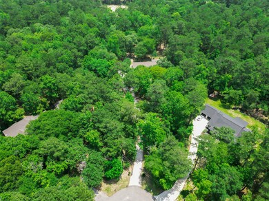 Peace, tranquility and privacy on this wooded lot.