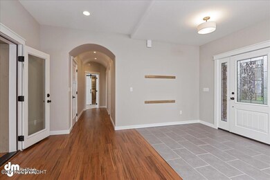 Entrance w/Custom Arch Ceilings