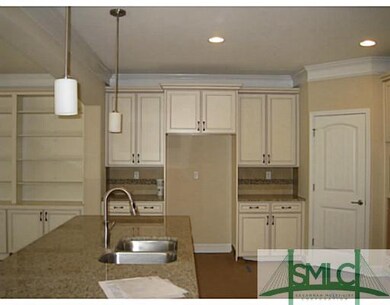 Kitchen. Kitchen island with granite counter tops,