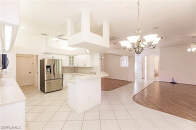 From breakfast area, into kitchen, dining and livi
