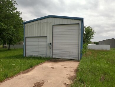 Detached garage with fence