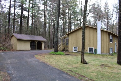 woodshed and trash can storage