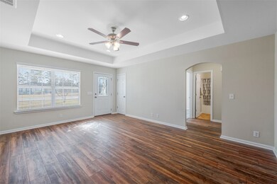 Front room splits the master bedroom from the seco