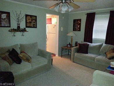 Beautiful living room with wall to wall carpet, ce