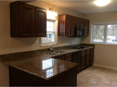 Kitchen. Cherry Kitchen w/ Granite Counters