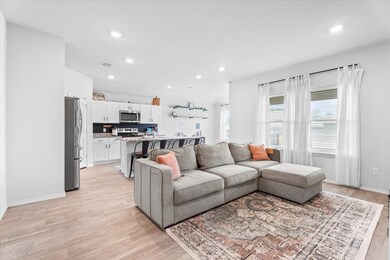 Large living room with lots of light.