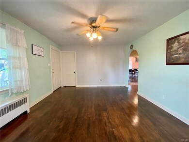 Front door enters into the living room.