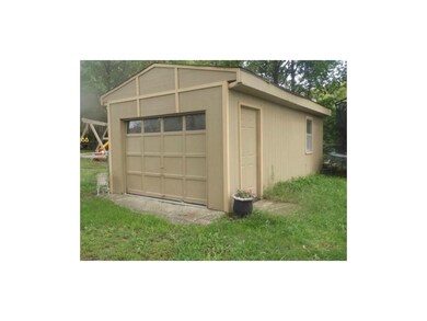 One car detached garage.