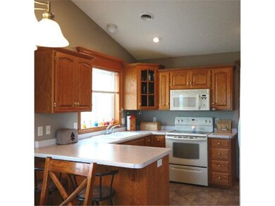 Beautiful kitchen offers oak cabinets