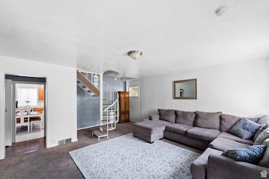 Living area featuring Spiral staircase