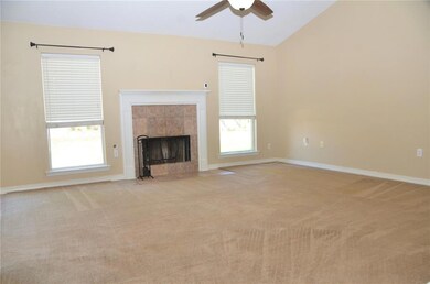 Spacious Den with Fireplace and Cathedral Ceilings