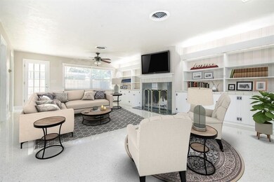 gracious family room area with built ins and grani