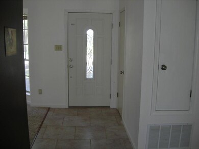 Foyer with tiled floors.