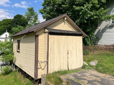 Detached Shed stores yard tools and toys