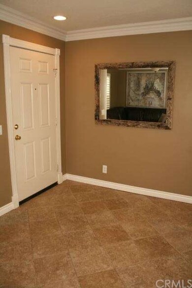 Front Entryway with crown moldings & baseboards th