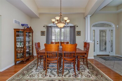 Main floor dining room features eleven foot ceilin