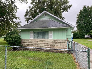 The front porch was enclosed at one time creating 