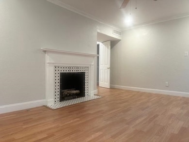 Unfurnished living room featuring visible vents, o