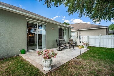 Large paved back yard lanai