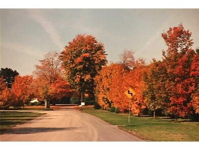 Exterior Front. The road and driveway leading up t