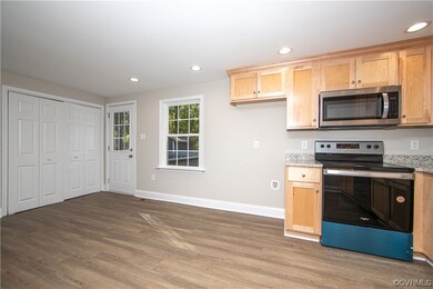 The kitchen also boasts easy access to the back de