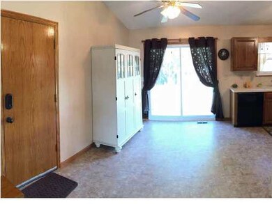 DINING AREA FEATURES UPDATED QUALITY PATIO DOOR