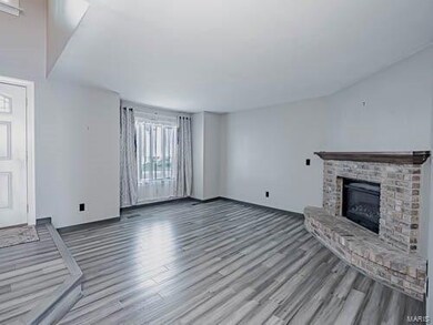 Entry Foyer and Living Room with Electric Fireplac