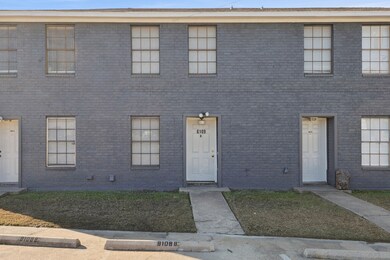 View of front of house featuring brick siding