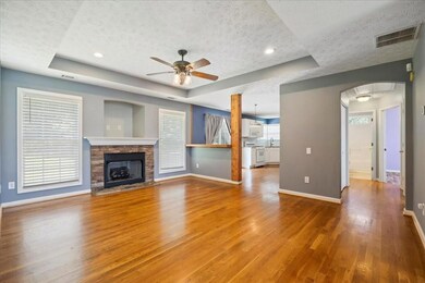Living Room with a view of the Kitchen