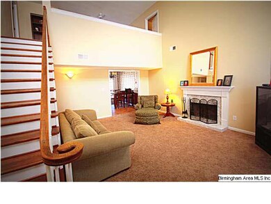 Welcome Home! Notice the beautiful hard wood stair