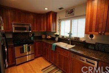 New kitchen has Baltic brown granite counter tops,