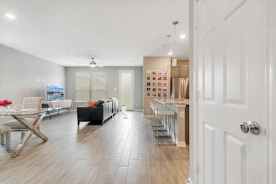 Open floor plan showing the dining, living and ent