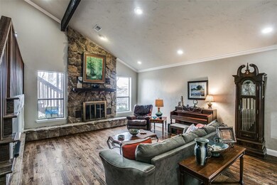 Living Room with Gas Starter Wood Burning Fireplace