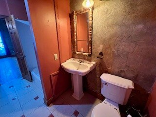 Full bathroom featuring tile patterned floors