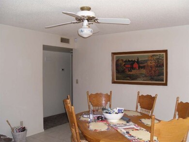 Dining room w/beautiful brick fireplace