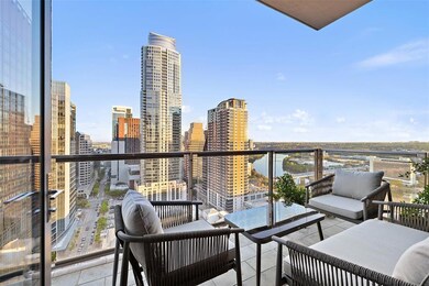 Balcony with a city view and a water view