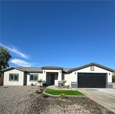 Single story home featuring a garage
